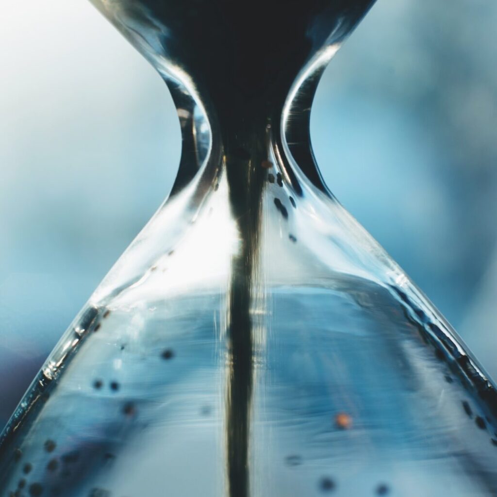 Sand,Running,Through,The,Bulbs,Of,An,Hourglass.,Deadline,Concept.